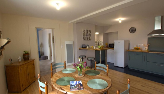 Charming apartment above a tea room with patio and contemporary decor