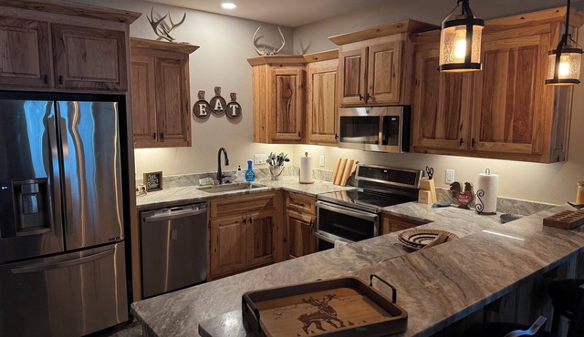 Charming Barndominium sits on 20 acres in Lonoke, AR.