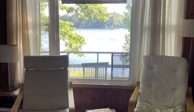 Charming bayside Kawarthas cottage with antique finishes and original art