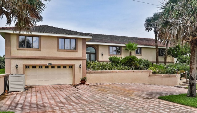 Charming beachfront home with grill, patio, central AC, & washer/dryer