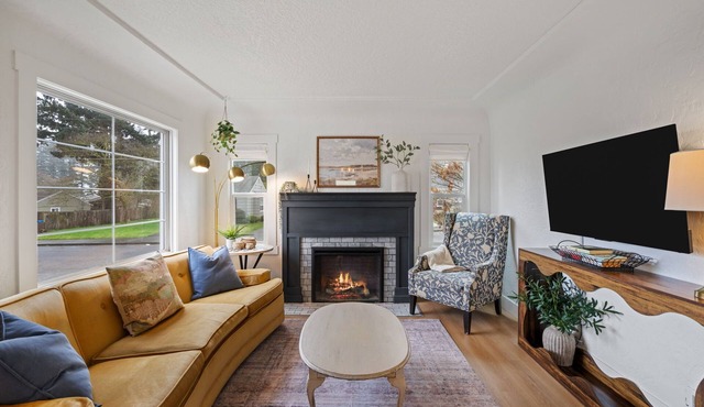 Charming Camas home with 3 bedrooms and a shared bath, just minutes from downtown. Relax by the fireplace, enjoy a bright living space, and cook in the updated kitchen. A comfortable spot for families or small groups visiting Camas, WA.