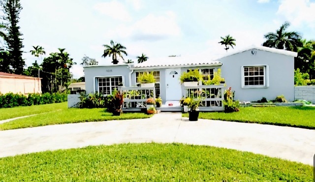 Charming centrally located 2-bedroom house with oversized backyard and gazebo.