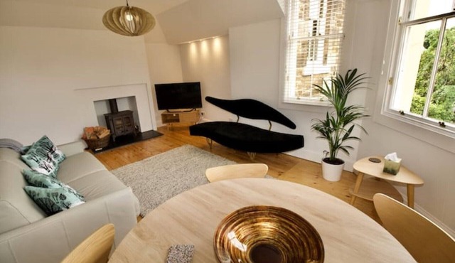 Charming coach house by the sea.