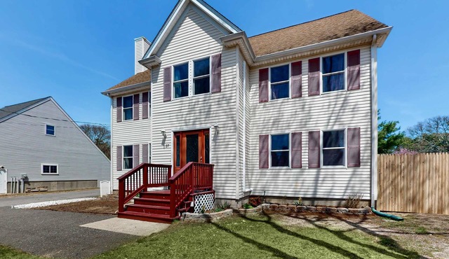 Charming coastal home with sunny rooms, private backyard, & walk to beach