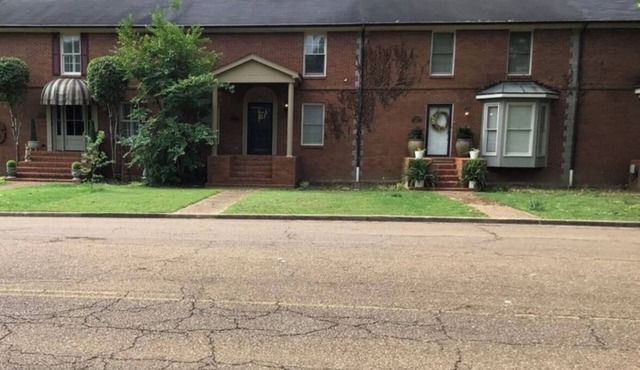 Charming condo 3-bedroom 2 bath, 2 living rooms! Stocked kitchen, laundry room