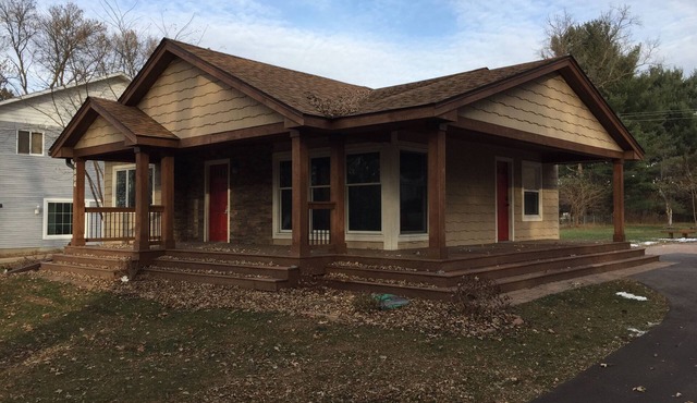 Charming cottage with views from the porch of Birch Lake near White Bear Lake Mn