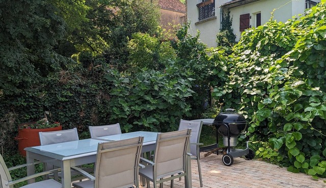 Charming Cottage with Fireplace, Terrace, and Parking