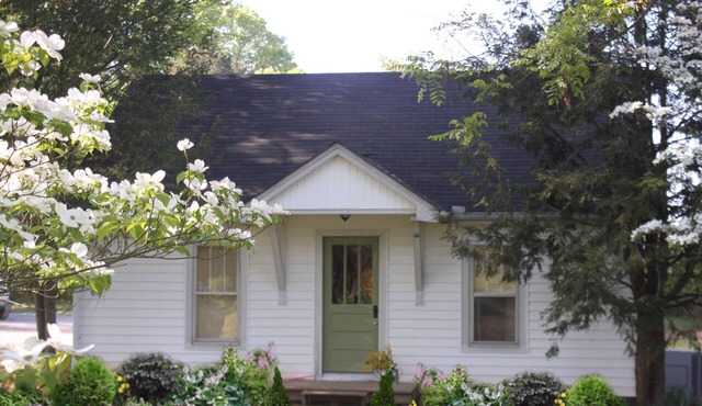 Charming cottage on 65 rolling acres
