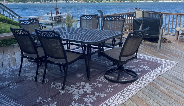 Charming Cottage on the Bay and Golf Course with private patio and boat dock.