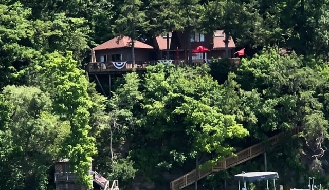 Charming cottage surrounded by nature. 368’ lake frontage and amazing views.