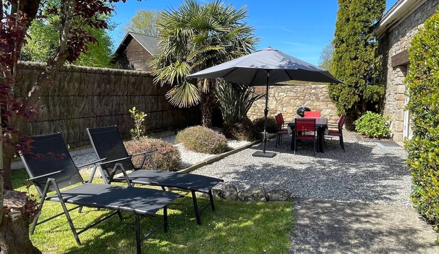 Charming Cottage with Fireplace, Mezzanine, and Garden near Guérande