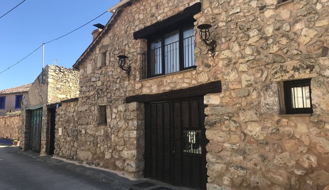 Charming cottage with fireplace perfect for relaxing with family or friends.