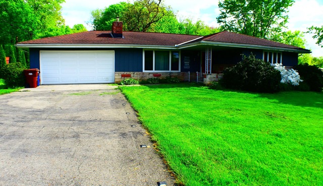 Charming Country Rustic home with upgraded amenities on a full acre.