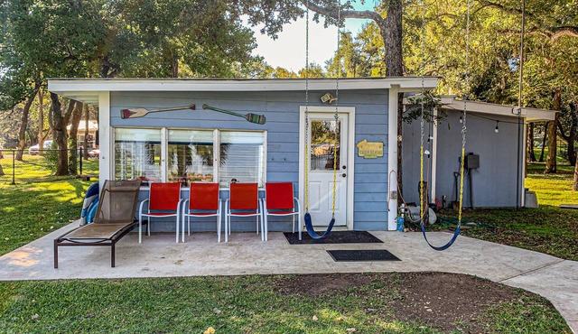 Charming dog-friendly lakefront home with lake view, dock, & washer/dryer