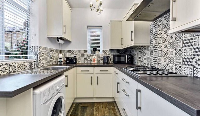 Charming Family Abode: Beautiful Home with Outdoor Space