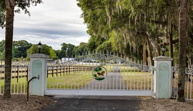 Charming farm with 2 homes, horse stables and heated pool ~ 5+ bedrooms near WEC