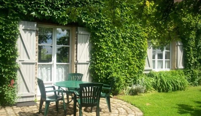 Charming Farmhouse with Fireplace, Garden, and Modern Amenities in Joué-l'Abbé