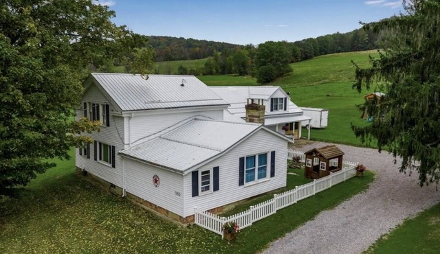Charming Farmhouse, including barn filled with horses and livestock