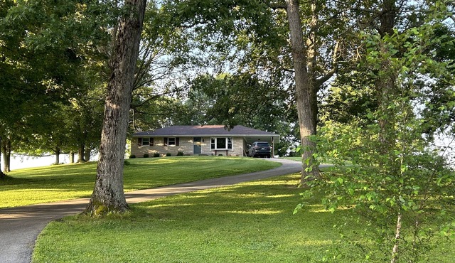 Charming Farmhouse Retreat with Scenic Views, Spacious Yard and Perfect Location