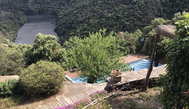 Charming MAS CEVENOL above the river with large swimming pool and Jacuzzi