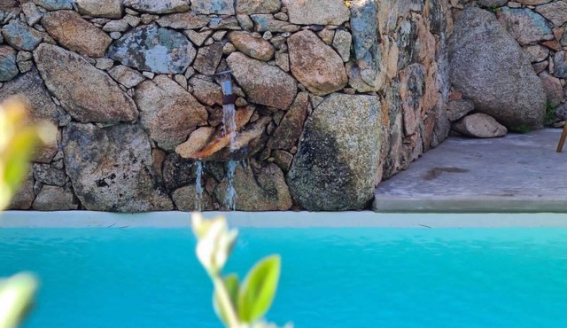 Charming villa with private pool and hotel services.