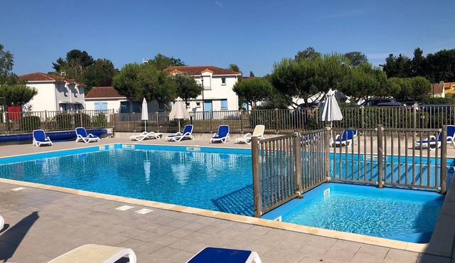 Charming Maisonette with Pool, Terrace, and Private Parking near Atlantic Coast