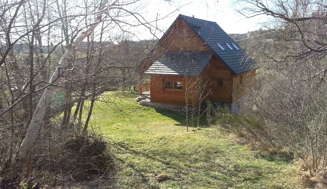 Charming wooden house in a green setting