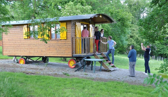 Charming Genoese caravan in Peyrat La Nonière on estate with castle and pond