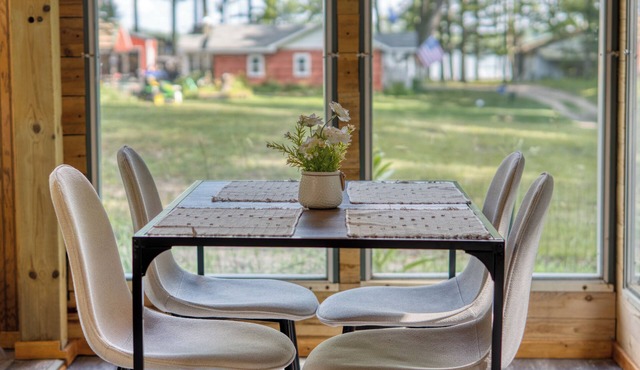 Charming Green Cabin with Private Round Lake Access, Minutes from Ludington