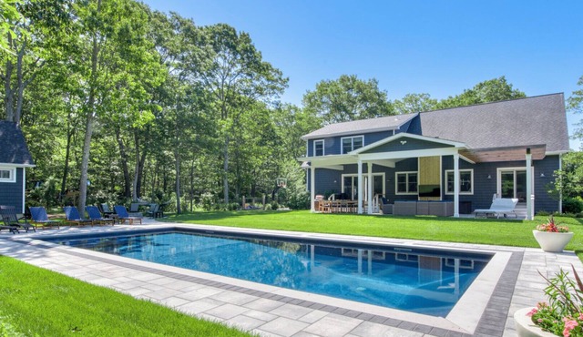 Charming Hamptons Bay home with a private heated pool, perfect for friends.