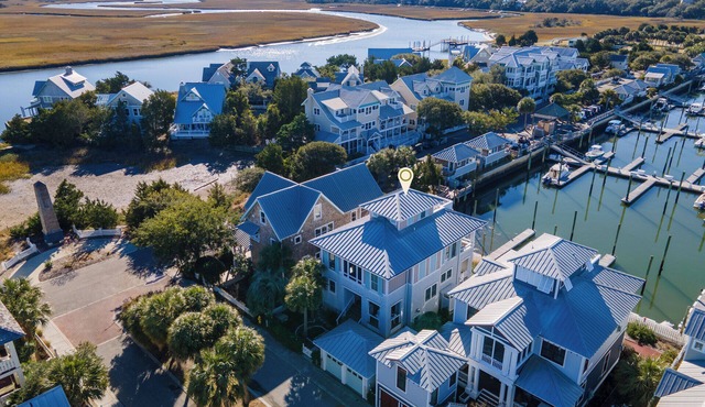 Charming Harbour Village home with marina-front views, ocean views, and creek views all in one!