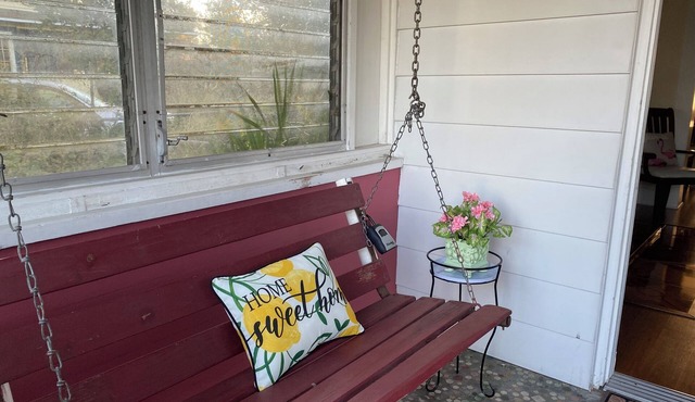 Charming Historic Cottage with Cozy Porch and Garden Retreat