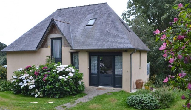 Charming house with balcony on green hill