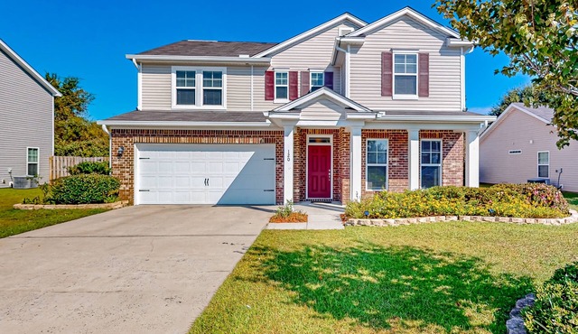 Charming home in great location with fenced yard, AC, & W/D