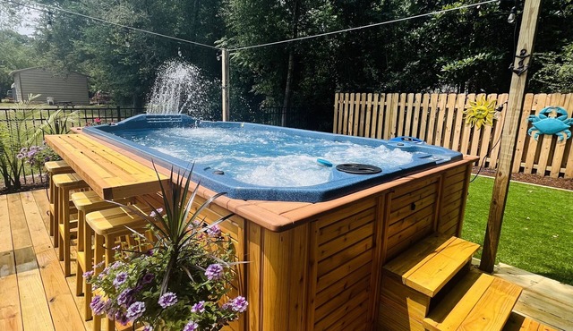 Charming home in Southport Center with large heated swim spa.
