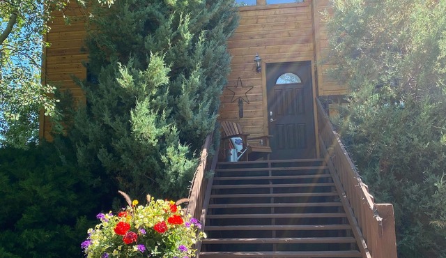 Charming home on Ski Hill Road with lush landscaping and a new hot tub.