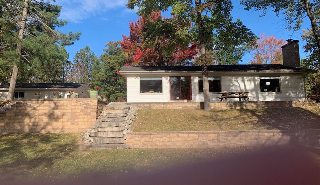 Charming Home on the mainstream of the Au Sable River.