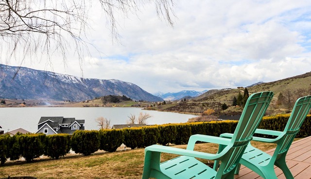 Charming home w/great deck, patio & views overlooking Roses Lake