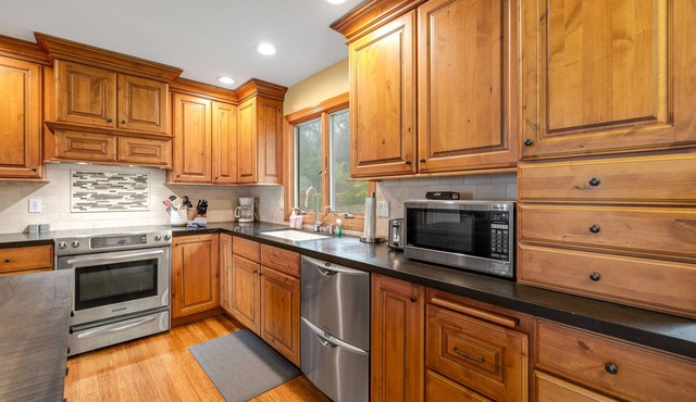 Charming home with amazing view, deck, & wood-burning fireplace