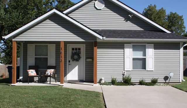 Charming home with firepit, large fenced yard, pet friendly.