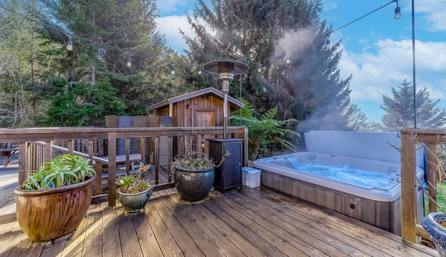 Charming home with game room, full kitchen, washer/dryer, & patio - dog-friendly