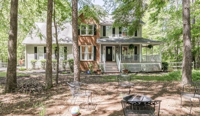Charming home with above ground pool.