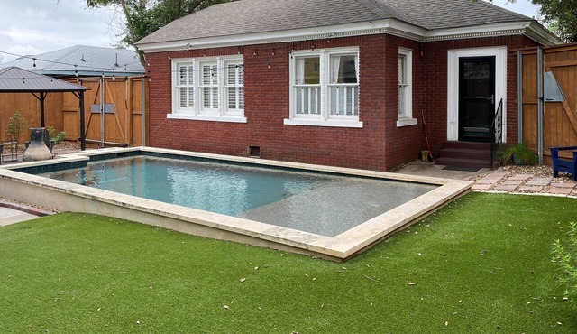 Charming home with pool, enclosed yard, patio & great Woodlawn Lake location