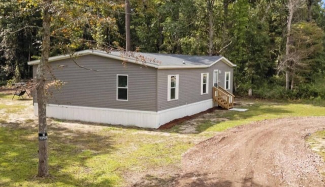 Charming house close to Holden Beach in Supply with ample parking for your boat.