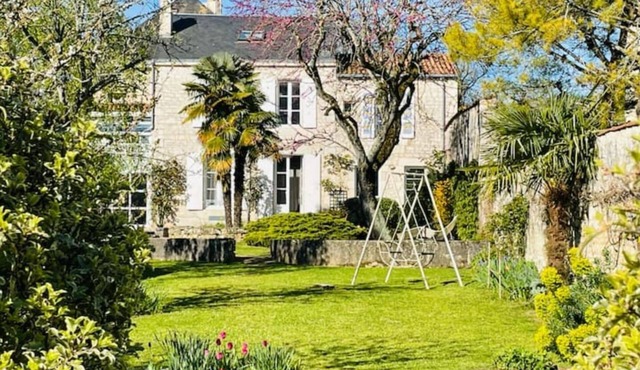 Charming house of 280m2 with heated swimming pool .