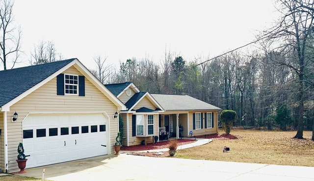 Charming house w/acreage offering peace in the countryside of Lincolnton Ga.