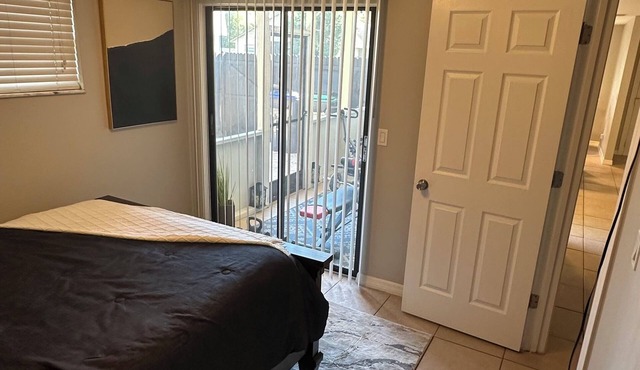 Charming house with AC, fitness equipment, & WIFI in the city of Orlando.