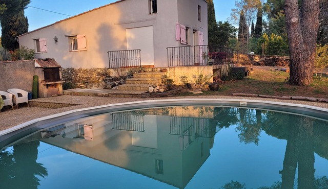 Charming house with swimmingpool and large private garden.