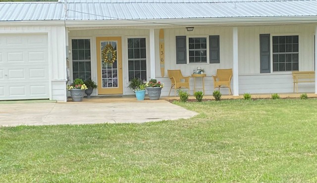 Charming lake front 2-bedroom cottage in Gray with WiFi and AC