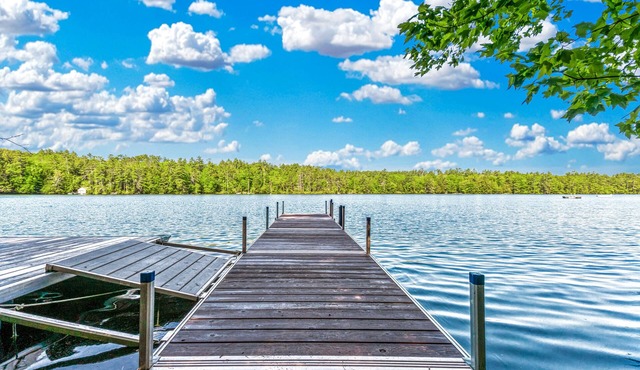 Charming lakefront cabin with private dock, deck & screened porch